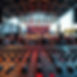 outdoor live concert from the perspective of the sound board centered in front of the stag