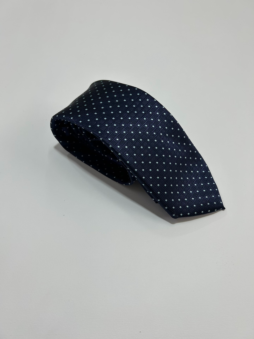 Cravatta uomo in raso fantasia fondo blu chiaro intreccio