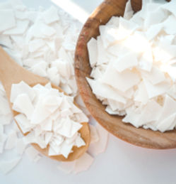Soy wax flakes used to make hand-poured soy candles.