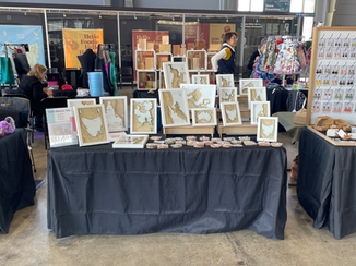 market stall selling wooden 3D topographic maps and birthday gift ideas 