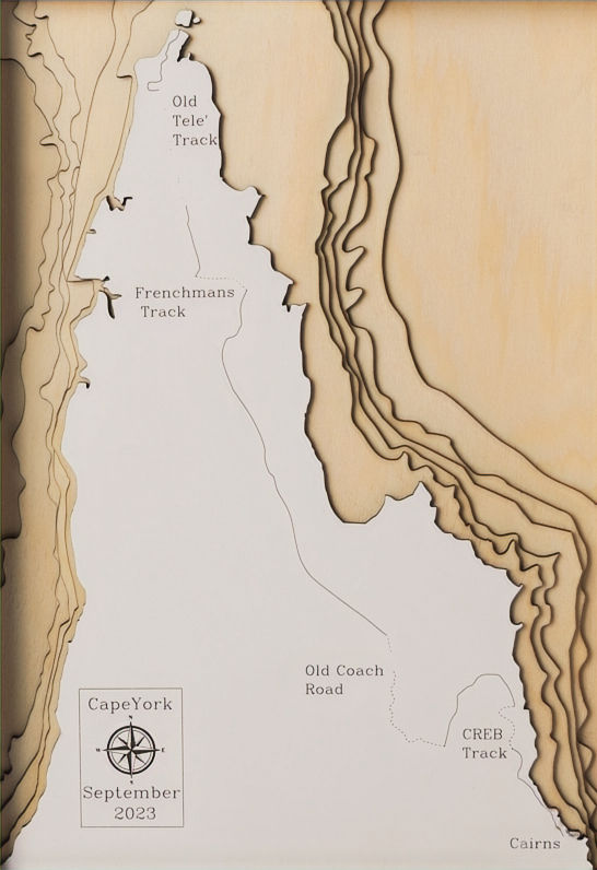 Closeup of a 3D wooden topographic and bathymetric map of Cape York, Queensland and the Old Telegraph Track