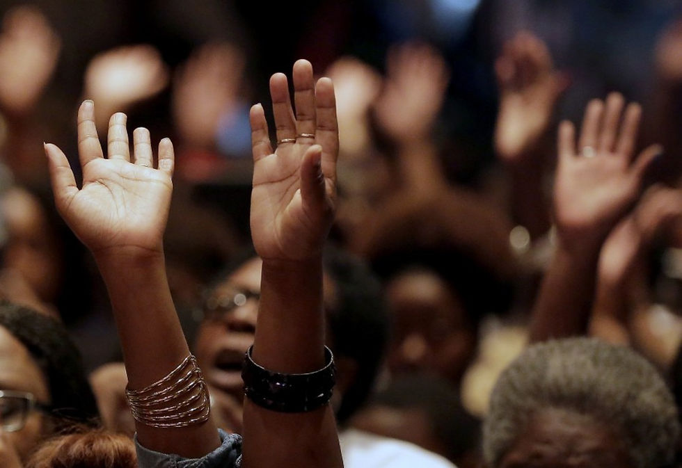 black-hands-in-praise-1.jpg