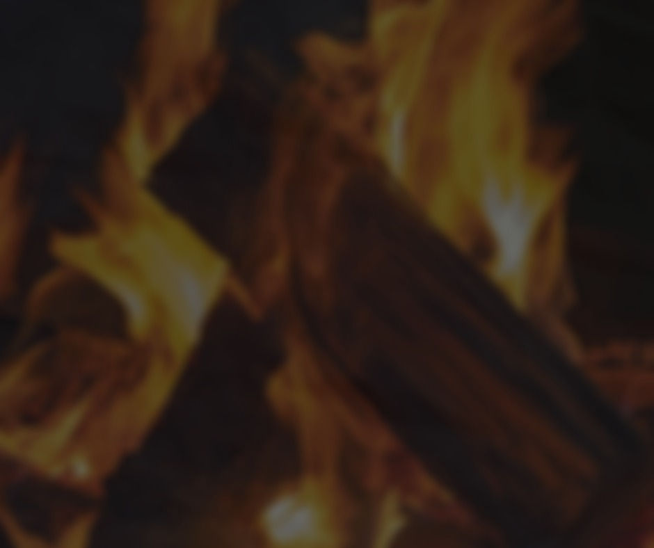 Flames blaring on a log fire