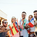 friends-holding-small-flags-on-urban-rooftop-2026-03-25-00-45-21-utc.jpg