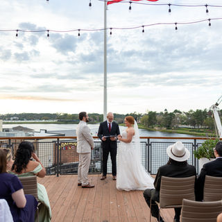 Brittany & Carlos’ Intimate Disney Springs Paddlefish Wedding