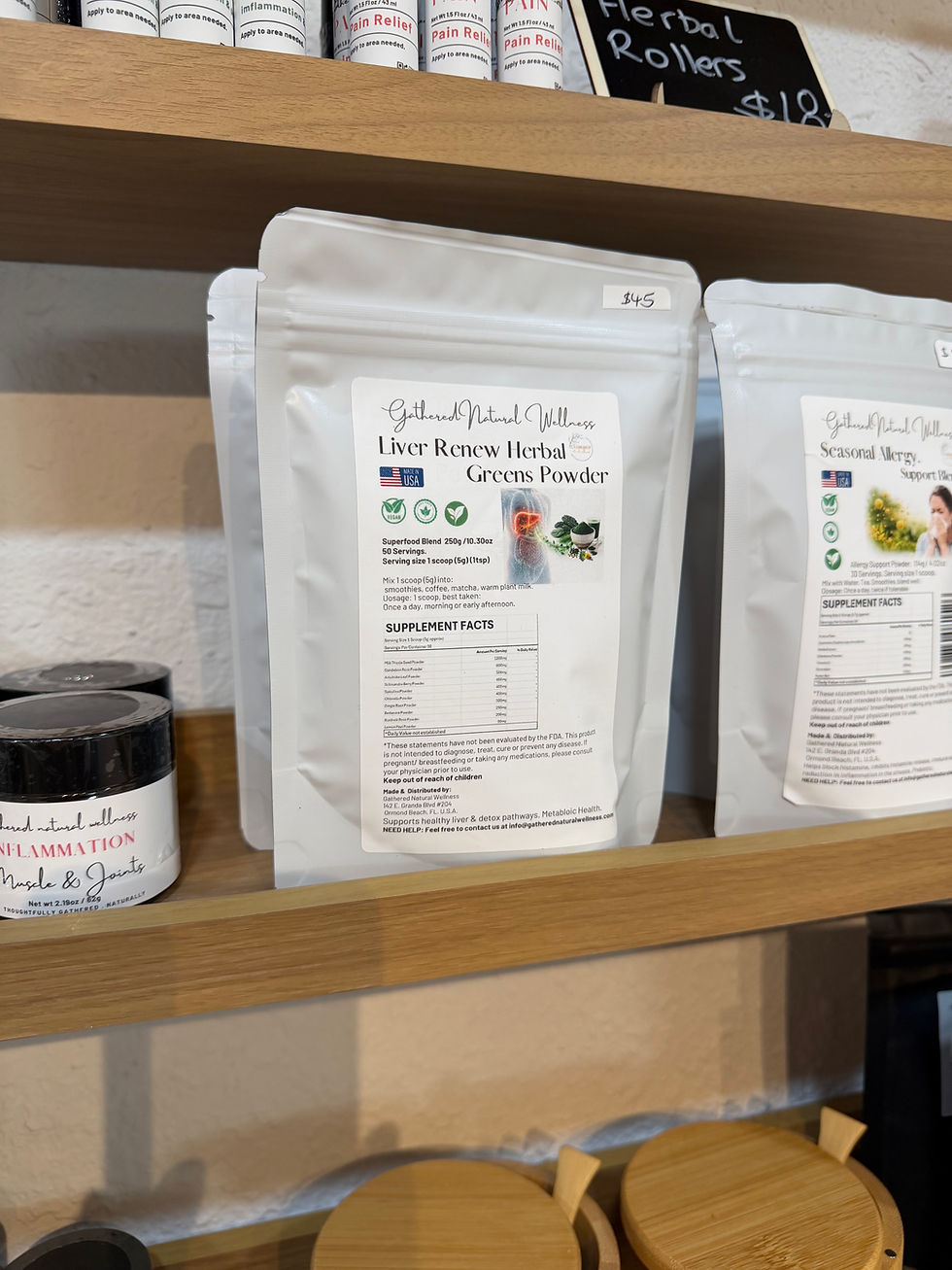 Thumbnail: Gathered Natural Wellness's Liver Renew Greens Powder on store shelf for purchase