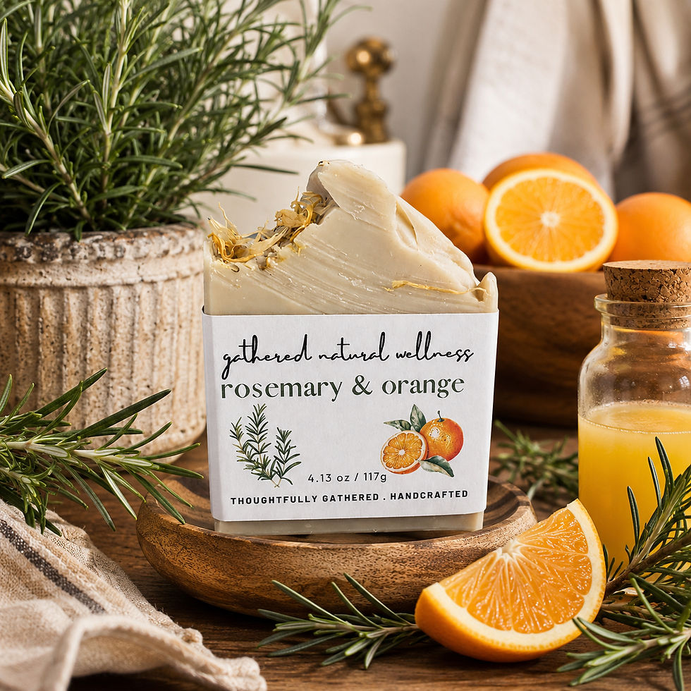 Thumbnail: A bar os rosemary and orange soap on wood board surrounded by orange and rosemary from gathered natural wellness