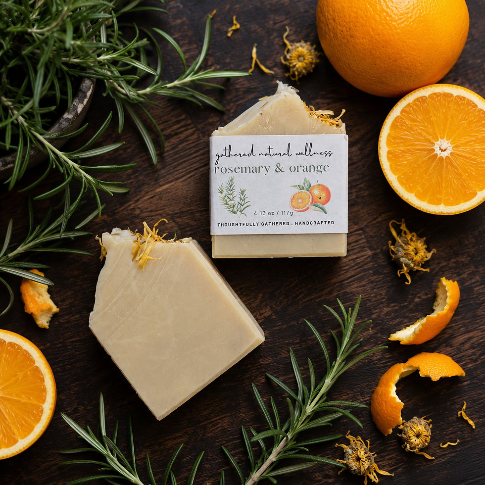 Thumbnail: Rosemary and Orange Soap from Gathered Natural Wellness (GNW) laying on a wood board surrounded by rosemary and oranges