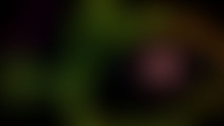 Cosmic scene with a bright, radiant light source near the center-right, emitting rays across a dark background