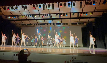 Dance students perform on stage