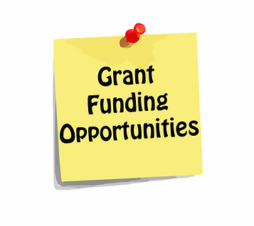 A postit note that says, "Grant Funding Opportunities"