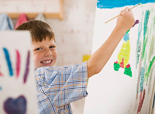 Child Painting Joyfully