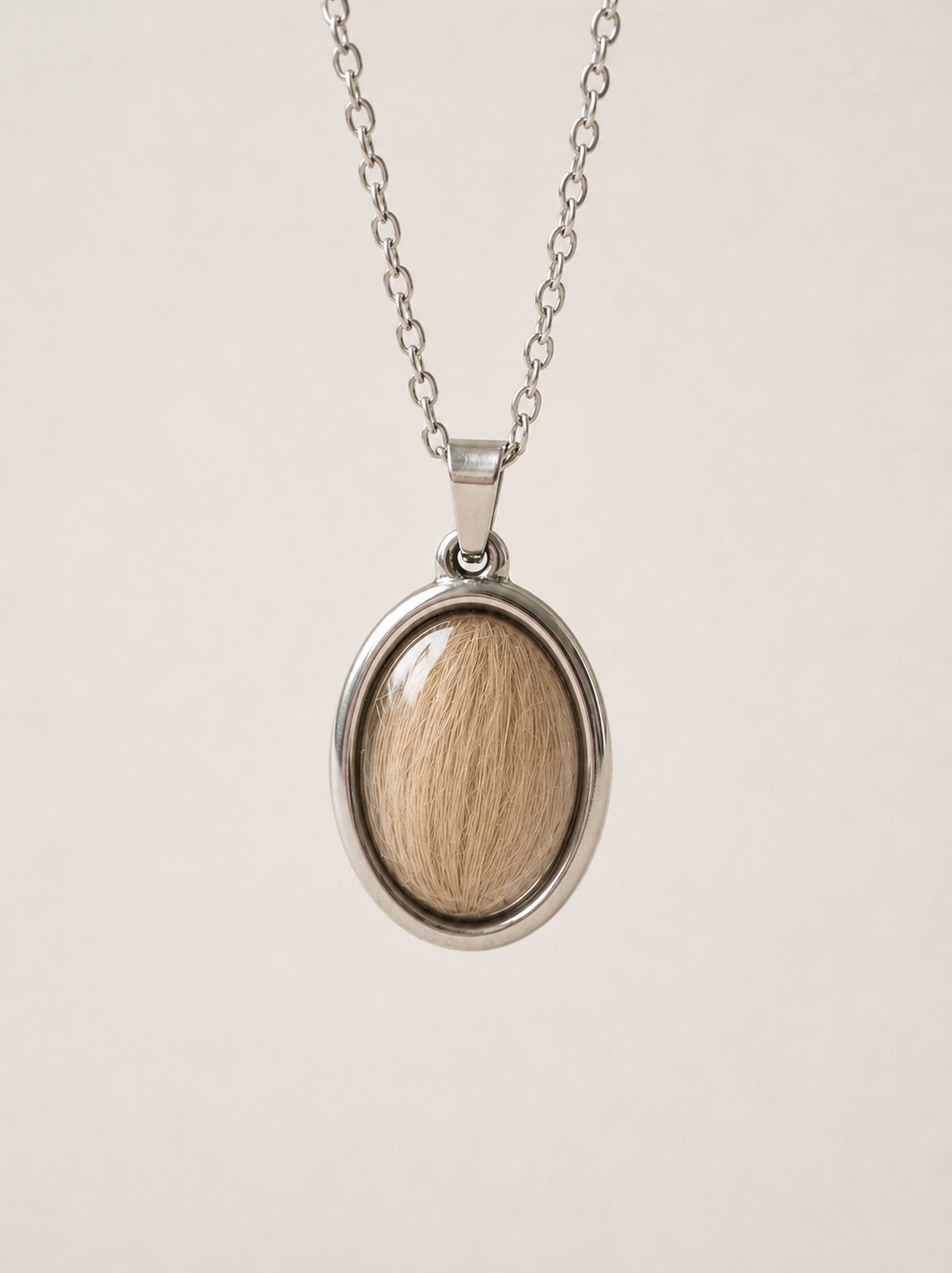 Colgante 'Oval' con pelo de tu bebé