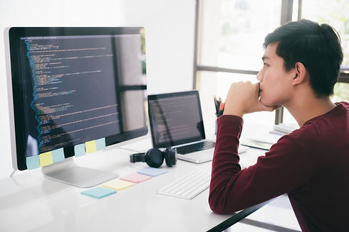 man-considers-code-on-computer-in-bright-office-2026-03-24-23-48-55-utc.jpg