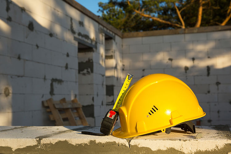 construction-hardhat-and-measuring-tape-measure-on-2026-01-05-23-24-00-utc.jpg