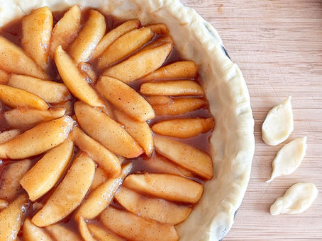 Apple pie filling recipe. Image shows apple pie filling in a pie before the pastry lid is put on.