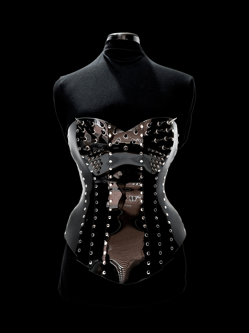 Black vinyl corset with silver spikes
