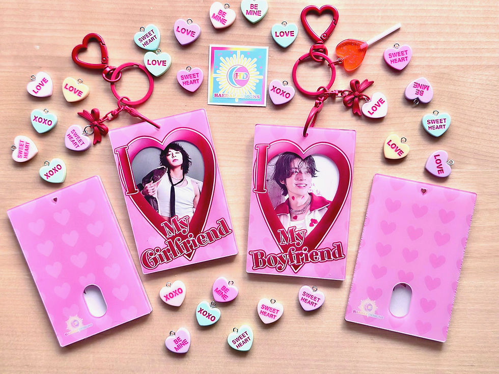 Close-up view of a photocard holder displaying colorful K-Pop photocards