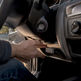 Close-up of car dashboard showing telematics device