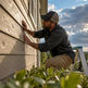 Hail damage inspection beside Minnesota home