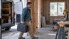 Contractor moving equipment into a job site