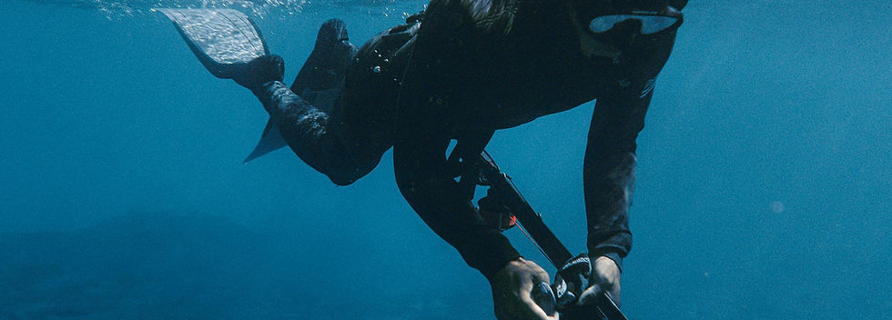 Spearfishing in the clear waters of Lake Michigan