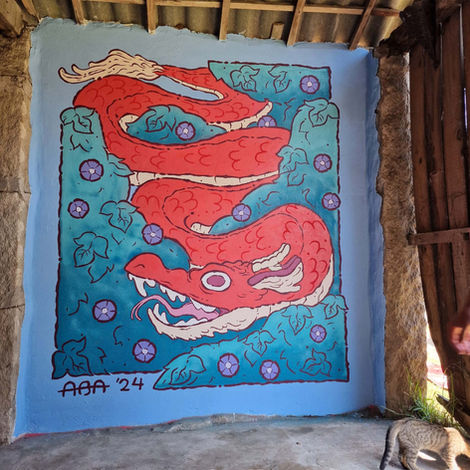 Mural illustration of a red snake-dragon slithering through green bushes with purple flowers.