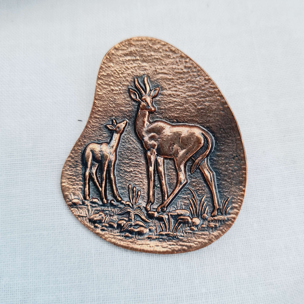 Mid-century copper Springbok brooch