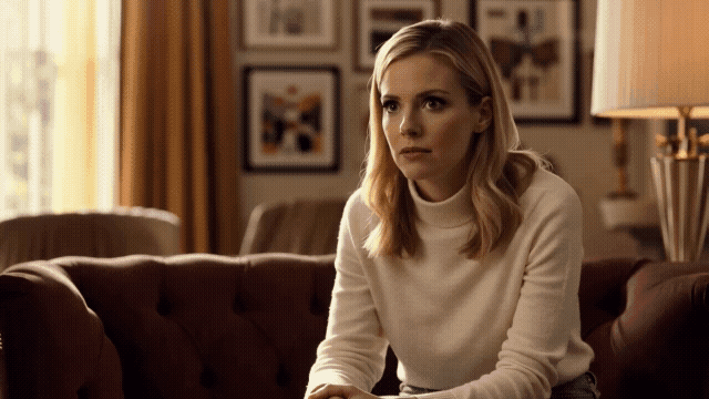 Gen-4_5 Cinematic commercial footage Medium close-up Warm living room interior Deep burgun