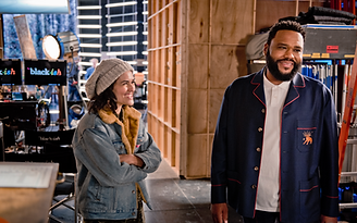 Christiann Keeler and Anthony Anderson laugh while taking a few moments between shots on set. 