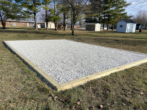 Mini Barn Base Installs including rock base and retainer 