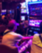 Reboot Australia The Prison FAQ: Man playing pokies with friend