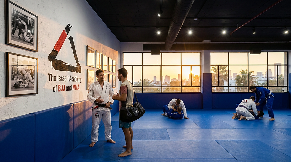 Professor Itay Leibovich talking with a new student at the Israeli Academy of BJJ and MMA in Tel Aviv