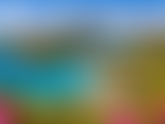 A panoramic view of the turquoise water and historic buildings at English Harbour.