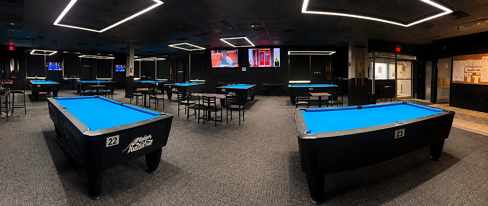 Spacious Newmarket pool hall with blue billiard tables and TVs.