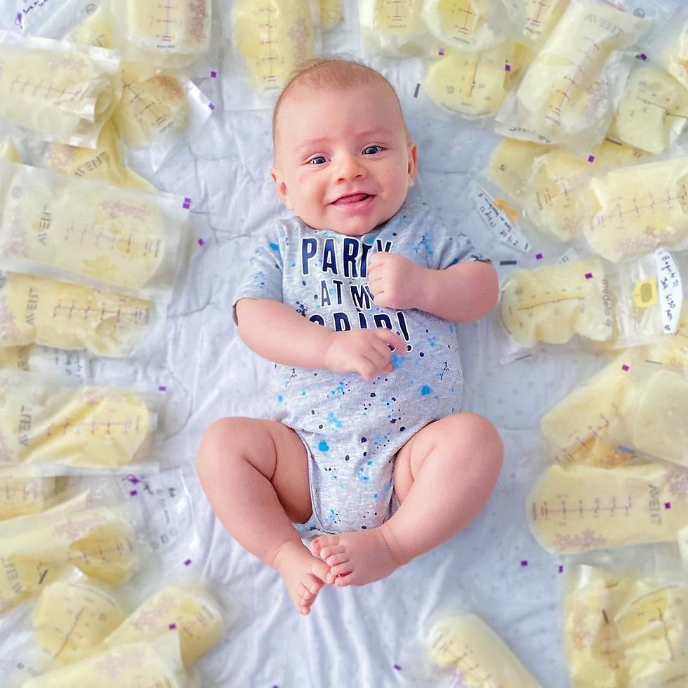 Baby and stored breast milk bags from a pumping mom