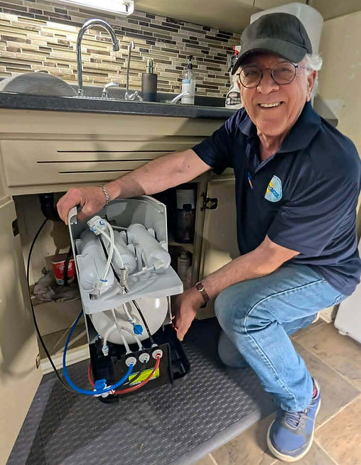 Installation professionnelle d'un système d'osmose inversée par un expert en purification d'eau d'Osmose en Estrie.