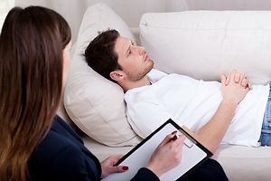 Young therapist working with patient on