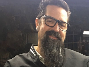 A photograph of Angel Diaz, bar manager of Mac’s Club Deuce.