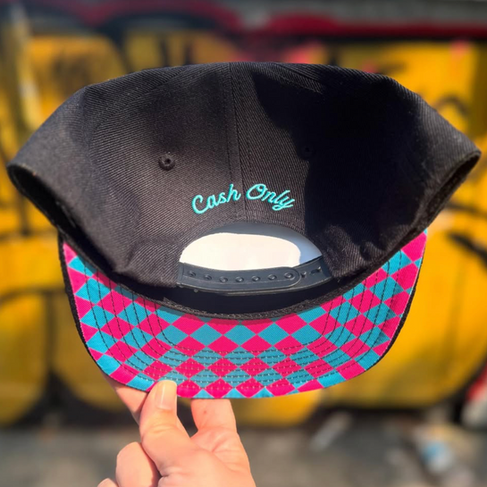 Photo of Mac's Club Deuce logo limited run of embroidered 305 Day snapback black hat in Miami Vice colors. Cash Only in the back, Miami Vice colored checks inside the bill. 