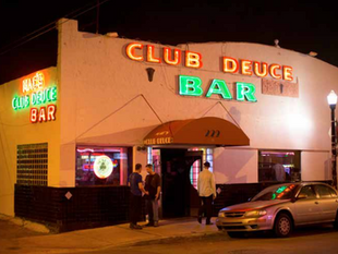 The exterior of Mac's Club Deuce taken by photographer Tim E White.
