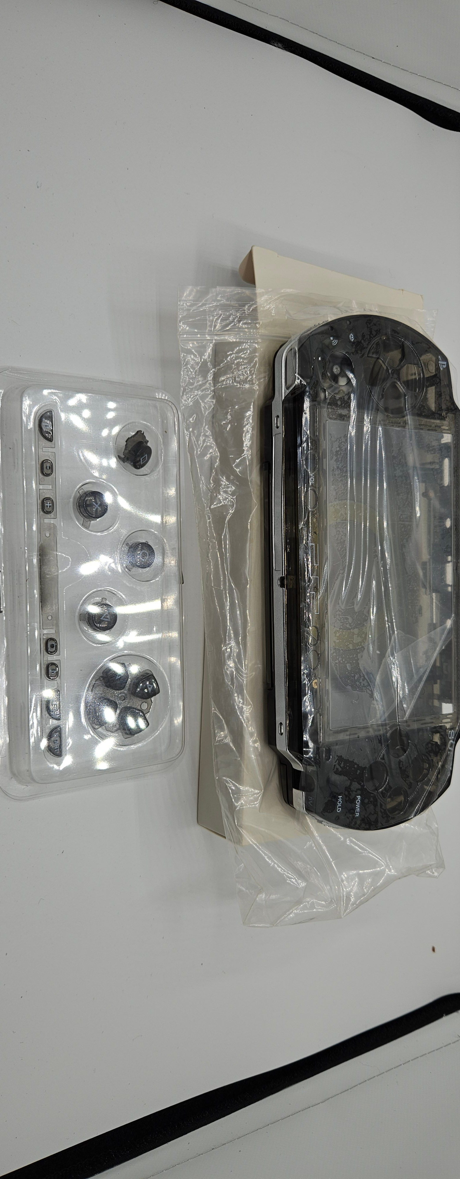 Psp 1000 shell kit- clear gray 
