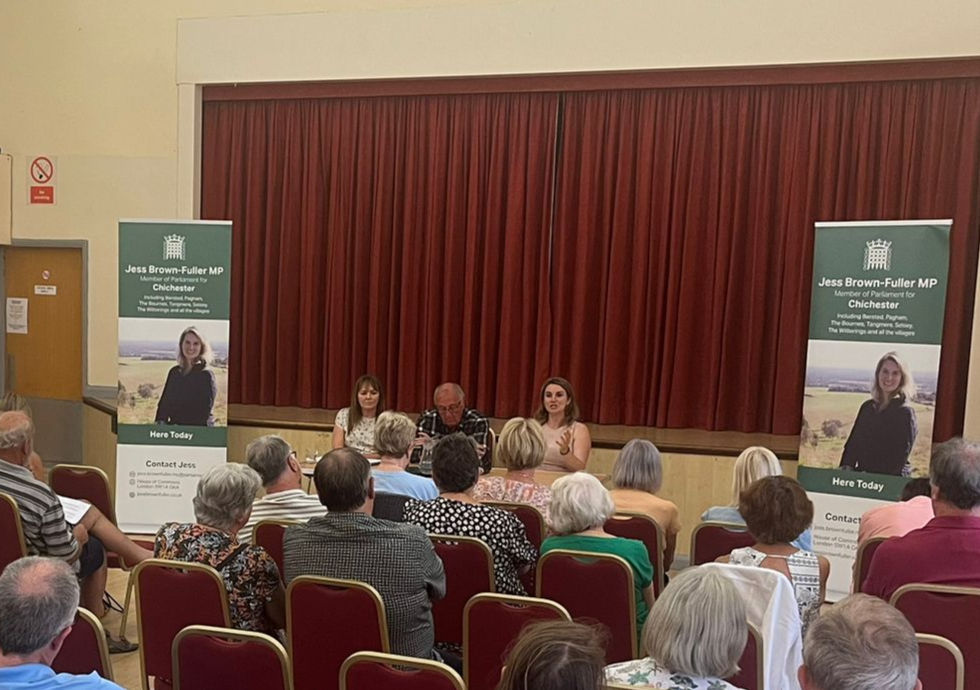 Jess Brown-Fuller taking to a room full of residents at Pagham Village Hall.