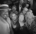 Black-and-white photograph of smiling guests celebrating together at Ziba’s Bistro & Wine Bar in Grant Park, Atlanta, Georgia.
