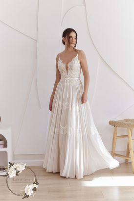 Boho wedding dress with deep V-neckline, lace bodice and flowing chiffon skirt - Lace & Love Brides collection