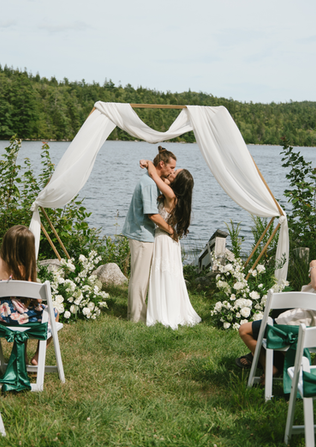Flowy chiffon wedding dress blowing in the wind, perfect for an outdoor nature ceremony