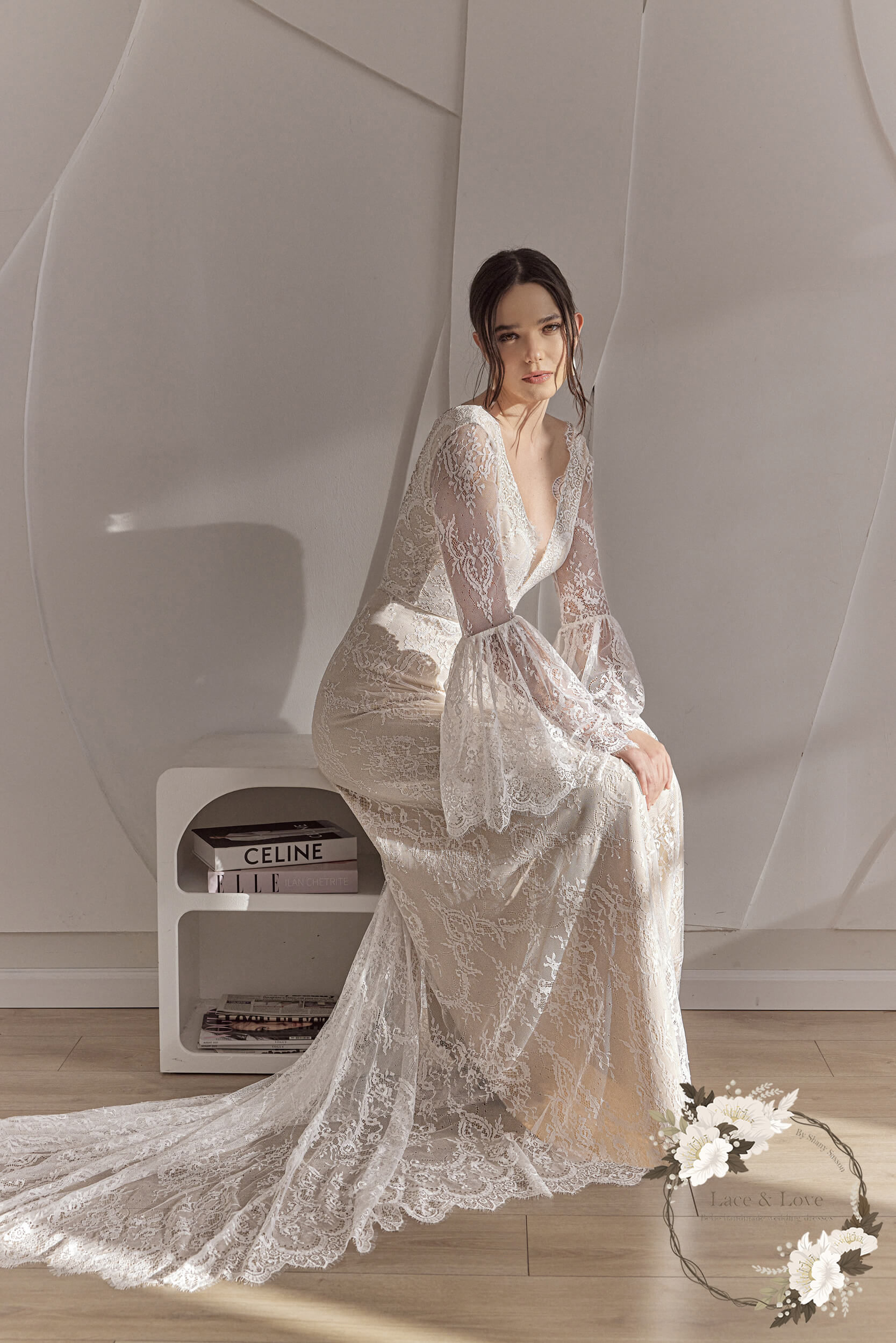 All-lace boho wedding dress with bell sleeves, deep V-neckline and flowing train - Lace & Love Brides