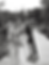 Boho wedding couple black and white portrait on wooden boardwalk