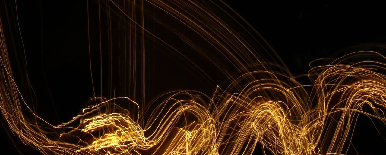 black-and-gold-glowing-abstract-lines-2g2ua37cv8140wuc_edited_edited.jpg