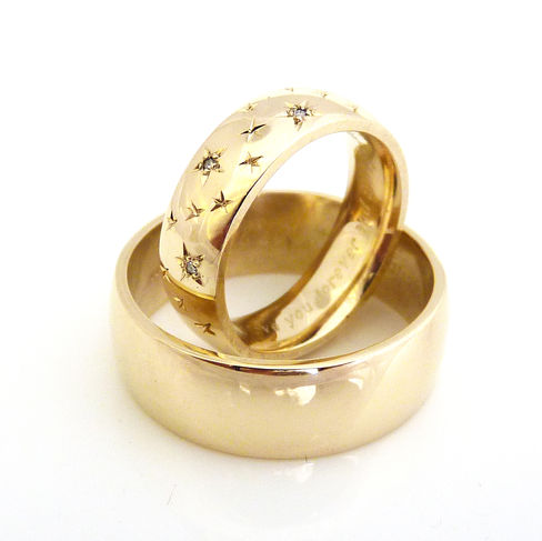 Gold rings with star engraving & diamond settings